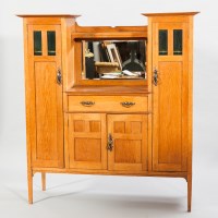 Lot 1155 - ARTS AND CRAFTS OAK SIDEBOARD the indented...