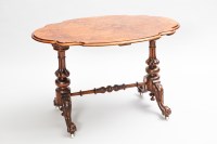 Lot 1166 - VICTORIAN WALNUT CENTRE TABLE of oval form, on...