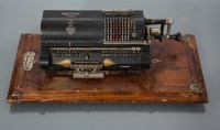 Lot 719 - MAHOGANY CASED BRITANNIC CALCULATING MACHINE...