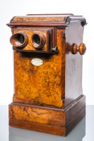 Lot 725 - LATE VICTORIAN WALNUT VENEERED STEREOSCOPIC...