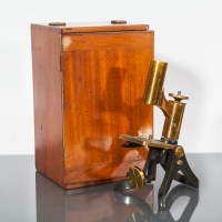 Lot 730 - CASED BRASS MONOCULAR MICROSCOPE BY HENRY...