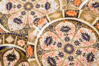 Lot 469 - FOUR ROYAL CROWN DERBY PLATES including a...