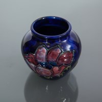 Lot 522 - SMALL MOORCROFT VASE decorated with tube-lined...