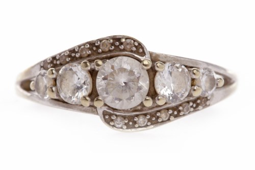 Lot 537 - NINE CARAT GOLD CZ FIVE STONE RING the largest...