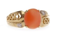 Lot 543 - NINE CARAT GOLD CORAL DRESS RING set with an...