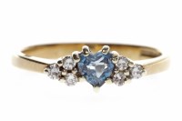 Lot 675 - NINE CARAT GOLD GEM AND DIAMOND RING with a...
