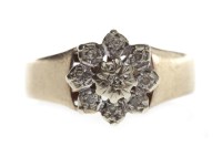 Lot 722 - NINE CARAT GOLD DIAMOND CLUSTER RING with...