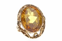 Lot 754 - CONTINENTAL GOLD YELLOW SAPPHIRE DRESS RING...