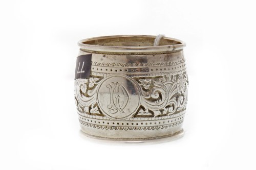 Lot 825 - VICTORIAN SILVER NAPKIN RING marks rubbed,...