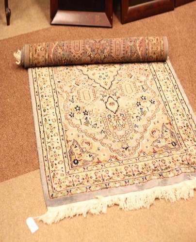 Lot 1021 - 20TH CENTURY AFGHAN RUG with a central diamond...