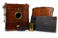 Lot 1417 - EARLY 20TH CENTURY MAHOGANY AND BRASS PLATE...
