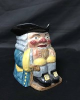 Lot 294 - CLARIFF CLIFF CHARACTER JUG hand painted,...