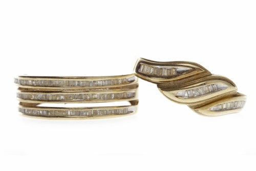 Lot 628 - NINE CARAT GOLD DIAMOND DRESS RING formed by...