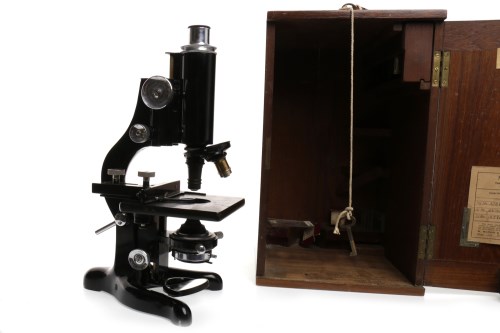 Lot 1474 - LACQUERED BRASS MONOCULAR MICROSCOPE BY W....