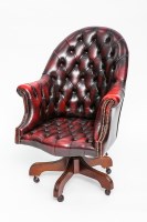 Lot 772 - RED LEATHER BUTTON BACK CAPTAIN'S CHAIR over...