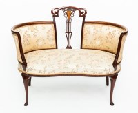 Lot 773 - EDWARDIAN CONVERSATION SETTEE with open centre...