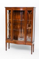 Lot 774 - EARLY 20TH CENTURY BOW-FRONTED DISPLAY CABINET...
