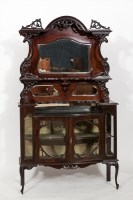 Lot 834 - LATE VICTORIAN CARVED MAHOGANY BOW-FRONTED...