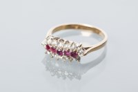 Lot 1680 - RUBY AND DIAMOND CLUSTER RING set with five...