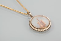 Lot 1701 - VICTORIAN CIRCULAR PENDANT with a central...