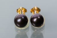 Lot 1711 - PAIR OF BLACK PEARL EARRINGS each set with a...