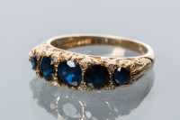 Lot 1713 - LATE VICTORIAN SAPPHIRE FIVE STONE RING the...
