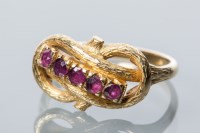 Lot 1716 - UNUSUAL VICTORIAN STYLE RUBY RING with a row...