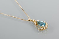 Lot 1761 - EIGHTEEN CARAT GOLD TOPAZ AND DIAMOND PENDANT...