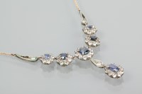 Lot 1794 - BLUE AND WHITE SAPPHIRE SET NECKLET set with...