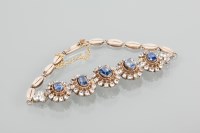 Lot 1796 - BLUE AND WHITE SAPPHIRE BRACELET set with five...