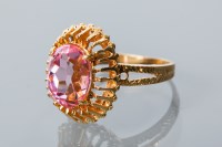 Lot 1803 - EIGHTEEN CARAT GOLD PINK PASTE DRESS RING the...