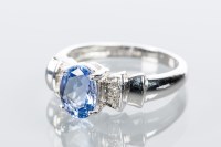 Lot 1806 - TANZANITE AND DIAMOND DRESS RING the central...