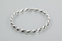 Lot 1837 - DANISH SILVER BANGLE of twisted form,...