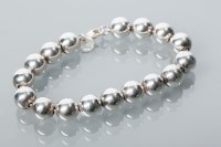 Lot 1840 - TIFFANY & CO SILVER BRACELET with spherical...