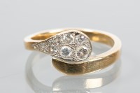 Lot 1848 - DIAMOND CLUSTER RING of crossover design, set...