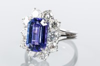 Lot 1856 - TANZANITE AND DIAMOND CLUSTER RING the central...