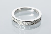 Lot 1863 - DIAMOND HALF ETERNITY RING set with brilliant...