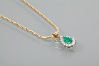 Lot 1883 - EMERALD AND DIAMOND CLUSTER PENDANT the...