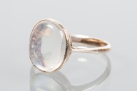 Lot 1892 - MOONSTONE SET DRESS RING the central oval...