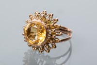 Lot 1900 - 1970s CITRINE DRESS RING with a large central...