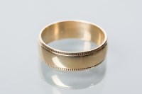 Lot 1911 - GENTLEMAN'S NINE CARAT GOLD WEDDING BAND with...