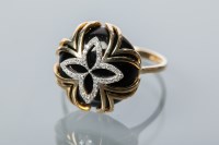 Lot 1934 - ONYX AND DIAMOND DRESS RING of circular form,...