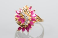 Lot 1936 - RUBY AND DIAMOND CLUSTER RING of floral design,...