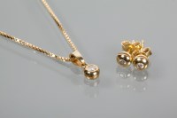 Lot 1956 - DIAMOND PENDANT AND EARRINGS SET the pendant...