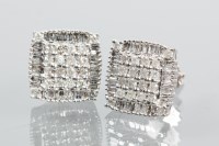 Lot 1973 - PAIR OF DIAMOND CLUSTER EARRINGS set with a...