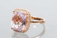 Lot 1985 - KUNZITE AND DIAMOND CLUSTER RING the central...