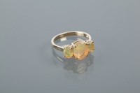 Lot 2013 - OPAL THREE STONE RING set with three oval...