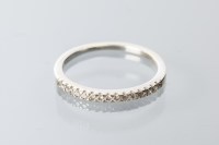 Lot 2032 - DIAMOND HALF ETERNITY RING set with brilliant...