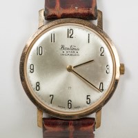 Lot 740 - GENTLEMAN'S NINE CARAT GOLD BENTIMA STAR SLIM...