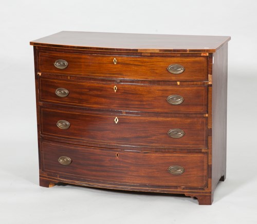 Lot 942 - REGENCY MAHOGANY BOW-FRONT CHEST of four long...